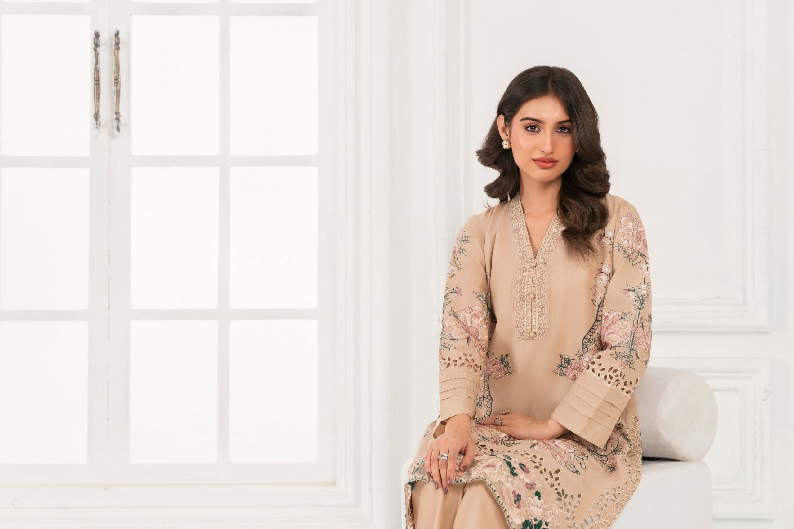 Model in an embroidered floral kurta from the Summer Edit